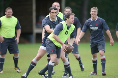 31.05.08 Wales rugby in S.Africa... Mark Jones passes under pressure from Jonathan Thomas.   