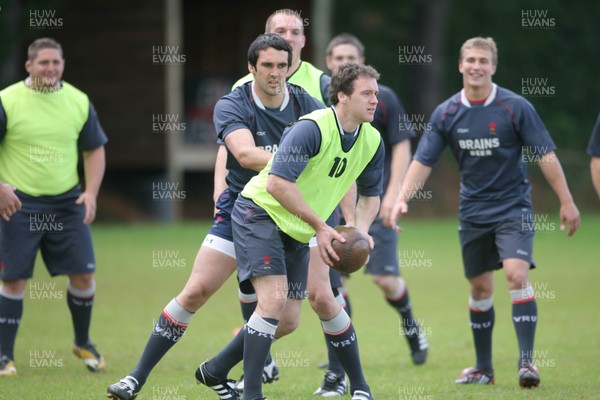31.05.08 Wales rugby in S.Africa... Mark Jones passes under pressure from Jonathan Thomas.   