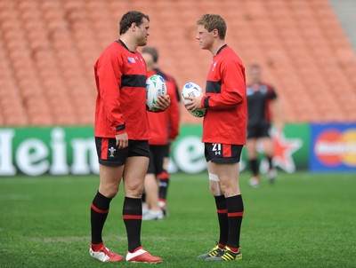 01.10.11 - Wales Rugby Captains Run - Jamie Roberts talks to Rhys Priestland during training. 