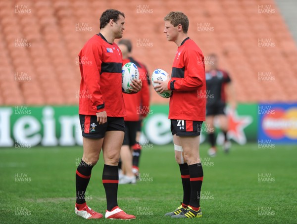 01.10.11 - Wales Rugby Captains Run - Jamie Roberts talks to Rhys Priestland during training. 