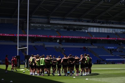 030726 - Wales Rugby Captains Run ahead of their first Nations Championship game against Fiji tomorrow in Cardiff - Team huddle