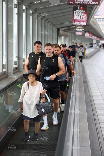 040725 - Wales Rugby walk to the stadium for their Captains Run at Mikuni World Stadium ahead of the game against Japan - Elliot Dee