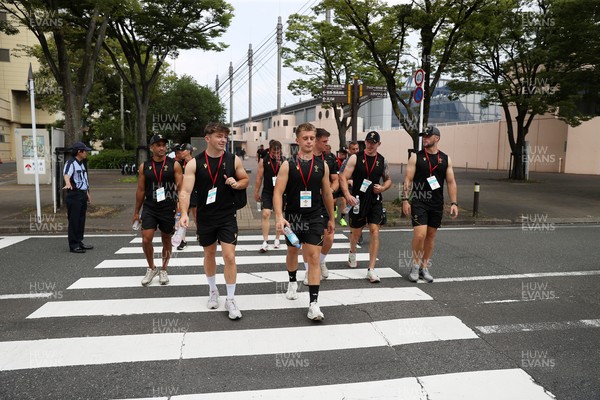 040725 - Wales Rugby walk to the stadium for their Captains Run at Mikuni World Stadium ahead of the game against Japan - Dan Edwards and Cameron Winnett, 