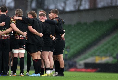 050326 - Wales Rugby Captains Run ahead of their Six Nations game against Ireland tomorrow evening - Wales team huddle