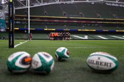 050326 - Wales Rugby Captains Run ahead of their Six Nations game against Ireland tomorrow evening - Wales team huddle in the Aviva Stadium