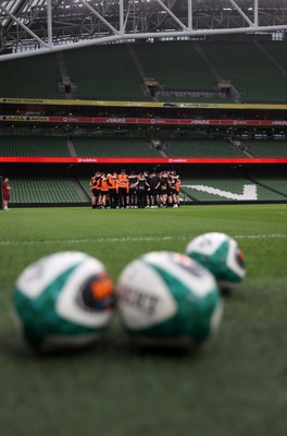 050326 - Wales Rugby Captains Run ahead of their Six Nations game against Ireland tomorrow evening - Wales team huddle in the Aviva Stadium
