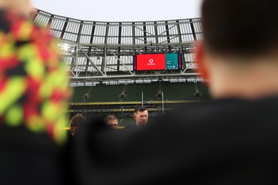 050326 - Wales Rugby Captains Run ahead of their Six Nations game against Ireland tomorrow evening - Wales team huddle in the Aviva Stadium