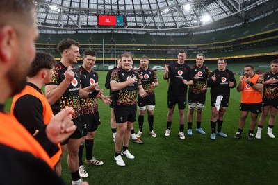 050326 - Wales Rugby Captains Run ahead of their Six Nations game against Ireland tomorrow evening - Louie Hennessey signs off the team huddle