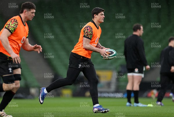 050326 - Wales Rugby Captains Run ahead of their Six Nations game against Ireland tomorrow evening - Louis Rees-Zammit during training
