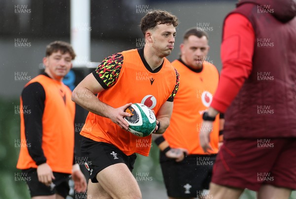 050326 - Wales Rugby Captains Run ahead of their Six Nations game against Ireland tomorrow evening - Louie Hennessey during training