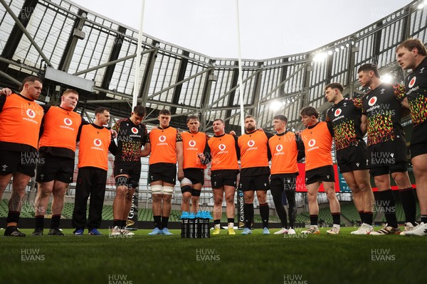 050326 - Wales Rugby Captains Run ahead of their Six Nations game against Ireland tomorrow evening - Captain Dewi Lake speaks to the team in the huddle