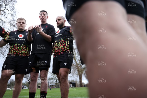 060226 - Wales Rugby Captains Run ahead of their first Six Nations game against England - Dewi Lake speaks in the team huddle
