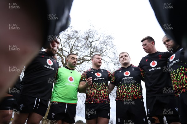 060226 - Wales Rugby Captains Run ahead of their first Six Nations game against England - Dewi Lake speaks in the team huddle