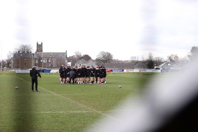 070325 - Wales Rugby Captains Run ahead of their 6 Nations game against Scotland tomorrow - Wales team huddle