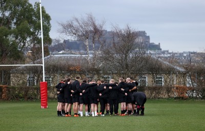 070325 - Wales Rugby Captains Run ahead of their 6 Nations game against Scotland tomorrow - Wales team huddle