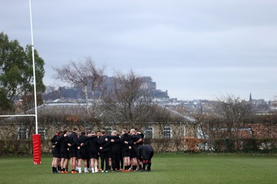 070325 - Wales Rugby Captains Run ahead of their 6 Nations game against Scotland tomorrow - Wales team huddle