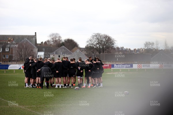 070325 - Wales Rugby Captains Run ahead of their 6 Nations game against Scotland tomorrow - Wales team huddle