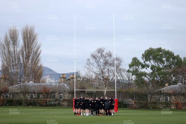 070325 - Wales Rugby Captains Run ahead of their 6 Nations game against Scotland tomorrow - Wales team huddle