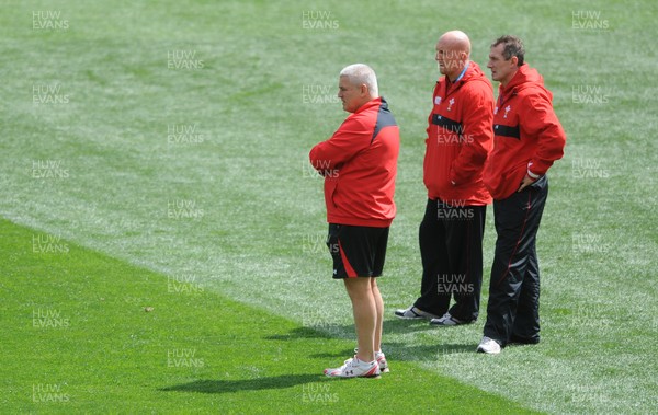 07.10.11 - Wales Rugby Captains Run - Head coach Warren Gatland looks on with his assistants Shaun Edwards and Rob Howley. 