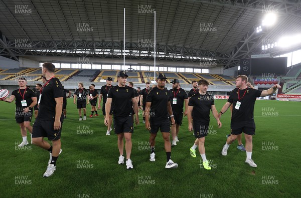 110725 - Wales Rugby Captains Run the day beofre their final tour match against Japan - Dewi Lake leads the team on the pitch