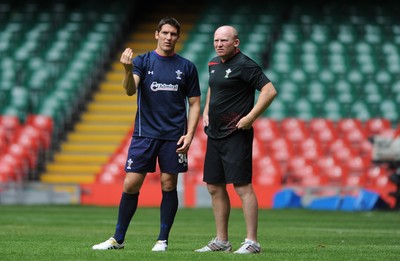 12.08.11 - Wales Rugby Captains Run - James Hook talks to kicking coach Neil Jenkins during training. 