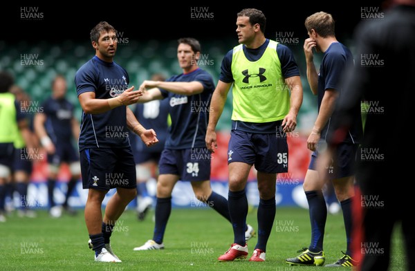 12.08.11 - Wales Rugby Captains Run - Gavin Henson talks to Jamie Roberts and Rhys Priestland during training. 