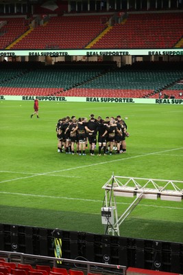 130326 - Wales Rugby Captains Run ahead of their last Six Nations game against Italy - Wales team huddle