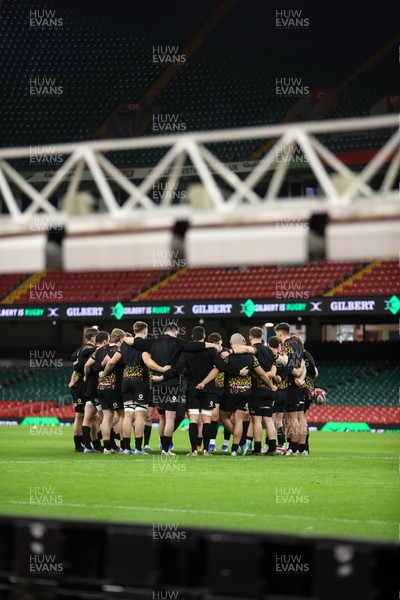 130326 - Wales Rugby Captains Run ahead of their last Six Nations game against Italy - Wales team huddle