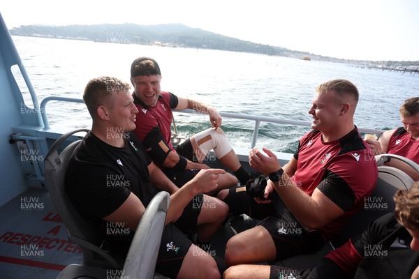 131023 - Wales Rugby Captains Run - The team take the The Toulon M�tropole Bateau-Bus, the fastest form of public transport to training - Will Rowlands, Jac Morgan and Dewi Lake