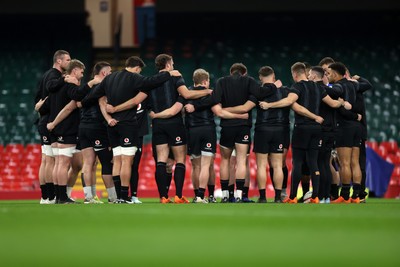 140325 - Wales Rugby Captains Run the day before their final Six Nations game against England - Wales team huddle