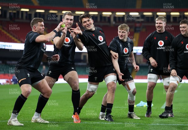 140325 - Wales Rugby Captains Run the day before their final Six Nations game against England - Elliot Dee, Max Llewellyn and Teddy Williams during training