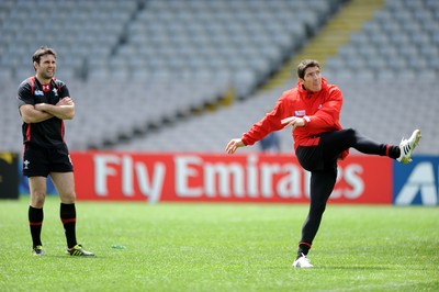 14.10.11 - Wales Rugby Captains Run - James Hook kicks as Stephen Jones looks on during training. 