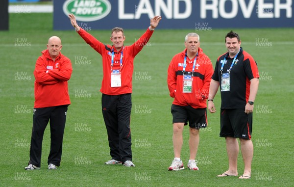 14.10.11 - Wales Rugby Captains Run - Wales defence coach Shaun Edwards, attack coach Rob Howley, head coach Warren Gatland and head of performance analysis Rhys Long during training. 