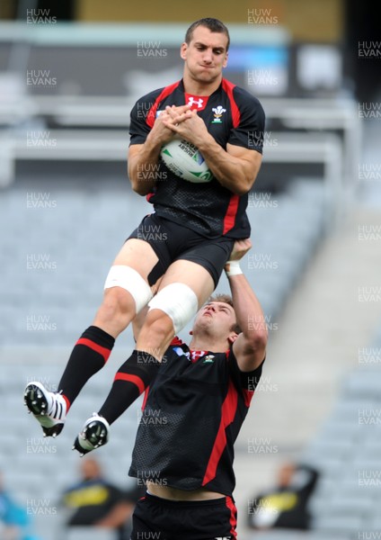 14.10.11 - Wales Rugby Captains Run - Sam Warburton is lifted by Dan Lydiate during training. 