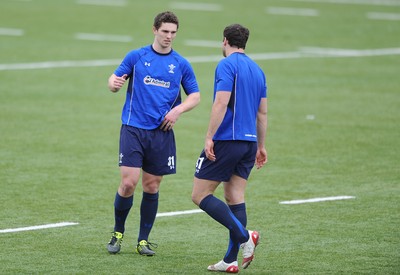 18.03.11 - Wales Rugby Captains Run - George North talks to Jamie Roberts(R) during training. 