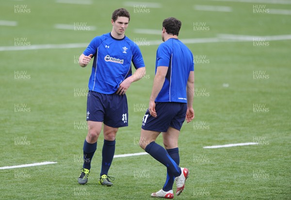 18.03.11 - Wales Rugby Captains Run - George North talks to Jamie Roberts(R) during training. 