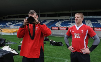 18.06.10 - Wales Rugby Captains Run - Deiniol Jones takes pictures of his team mates with a photographers camera during a visit to Carisbrook, Dunedin. 