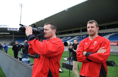 18.06.10 - Wales Rugby Captains Run - Ken Owens takes pictures of his team mates with a photographers camera during a visit to Carisbrook, Dunedin. 