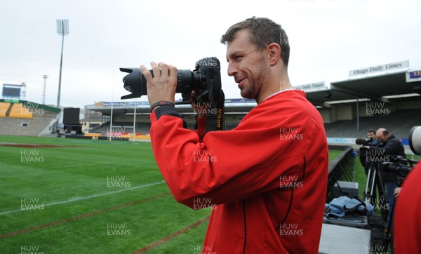 18.06.10 - Wales Rugby Captains Run - Deiniol Jones takes pictures of his team mates with a photographers camera during a visit to Carisbrook, Dunedin. 