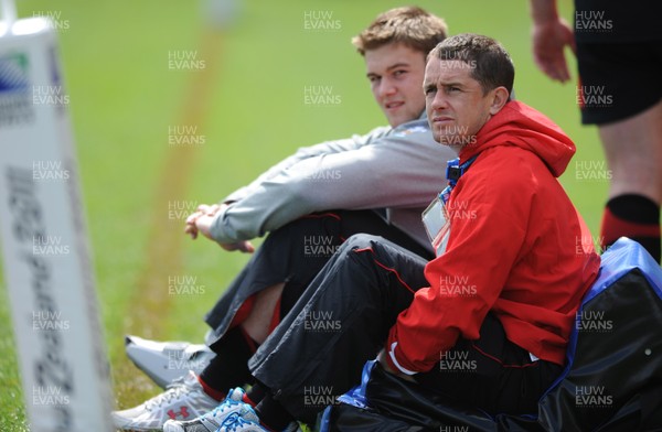 25.09.11 - Wales Rugby Captains Run - Shane Williams and Dan Lydiate look on during training. 
