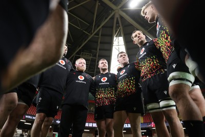 281125 - Wales Rugby Captains Run ahead of their game against South Africa - Dewi Lake in the team huddle