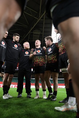 281125 - Wales Rugby Captains Run ahead of their game against South Africa - Dewi Lake in the team huddle