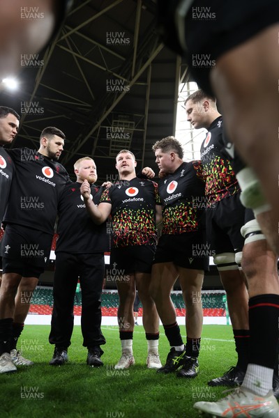 281125 - Wales Rugby Captains Run ahead of their game against South Africa - Dewi Lake in the team huddle