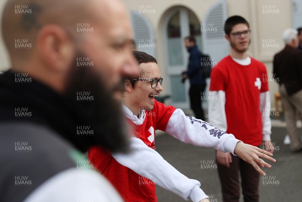 041023 - Picture shows the Wales Rugby Team visiting IME Le Rondo Croix Rouge in Versailles, a school for children with disabilities - 