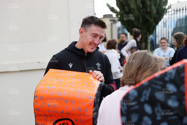 041023 - Picture shows the Wales Rugby Team visiting IME Le Rondo Croix Rouge in Versailles, a school for children with disabilities - Josh Adams
