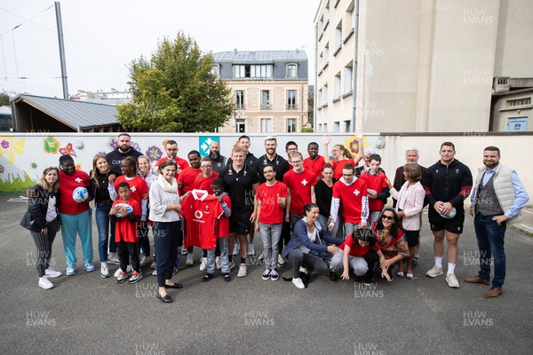 041023 - Picture shows the Wales Rugby Team visiting IME Le Rondo Croix Rouge in Versailles, a school for children with disabilities - Group photo
