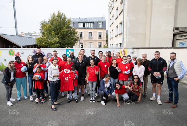 041023 - Picture shows the Wales Rugby Team visiting IME Le Rondo Croix Rouge in Versailles, a school for children with disabilities - Group photo