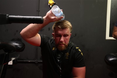 130625 - Picture shows the Welsh Rugby team during extreme heat training, where the air temperature was 388 degrees celsius and 857 humidity - Garyn Phillips during training