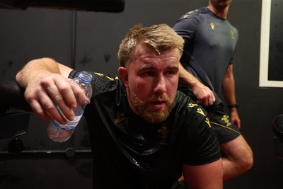 130625 - Picture shows the Welsh Rugby team during extreme heat training, where the air temperature was 388 degrees celsius and 857 humidity - Garyn Phillips during training