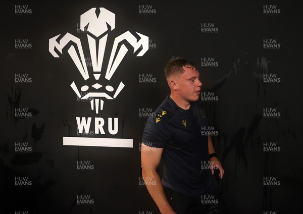 130625 - Picture shows the Welsh Rugby team during extreme heat training, where the air temperature was 388 degrees celsius and 857 humidity - Sam Costelow during training